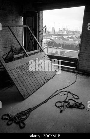UK, London, Docklands, Isle of Dogs, Coldharbour, 1974. View to South West India Dock from a disused warehouse on Coldharbour - near to The Gun pub. The warehouse is now demolished and new housing built on corner Horatio Place & Coldharbour. Stock Photo
