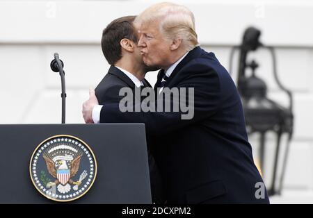 French President Emmanuel Macron hugs with US President Donald Trump after speaking at a state welcome at the White House in Washington, DC, on April 24, 2018.Photo by Olivier Douliery/Abaca Press Stock Photo