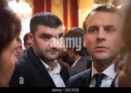 French President Emmanuel Macron discusses with guests next to the French President of the Young Farmers Association Jeremy Decerle after he delivered a speech to the new generation of French farmers invited at the Elysee Palace in Paris, France, on February 22, 2018. Photo by pool Hamilton/Rea/ABACAPRESS.COM Stock Photo