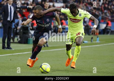 Kylian Mbappe Of PSG, Abdoulaye Bamba Of Angers (left) During The ...