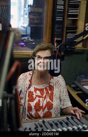 Great Britain / England / Havant / Angel Radio/ /Mature woman radio broadcaster. Stock Photo