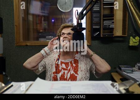 Great Britain / England / Havant / Angel Radio/ /Mature woman radio broadcaster. Stock Photo