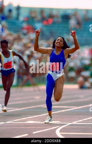 Florence Griffith Joyner competing in the 200m at the 1988 U.S. Olympic ...