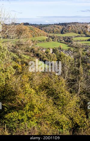 The village of Uley tucked in beneath the Cotswold escarpment viewed from Uley Bury, an Iron Age hill fort, Gloucestershire UK Stock Photo