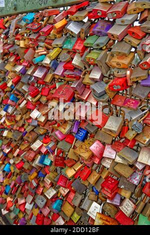 Love Locks, padlocks attached to a bridge. Stock Photo