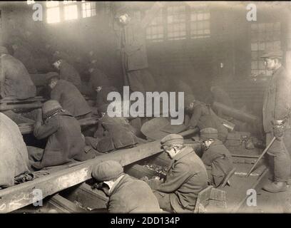 Sorting coal at a coal mine Stock Photo - Alamy