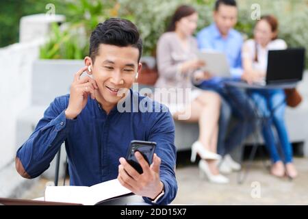 Man video calling his colleague Stock Photo