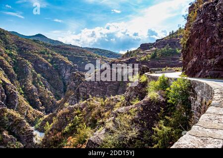 Gorges de Daluis or Chocolate canyon as it is called by locals because of the rocks color formed by Var river. Provence-Alpes-Cote d'Azur region of Fr Stock Photo