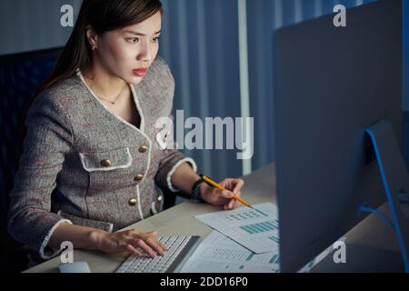 Working in office late at night Stock Photo