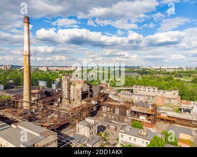 Aerial drone shot of old coke coal industrial zone with smoke stack. Air pollution concept. Stock Photo
