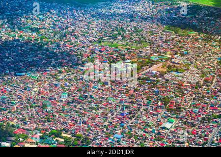Manila suburb with small houses aerial panoramic view from the plane, Philippines Stock Photo