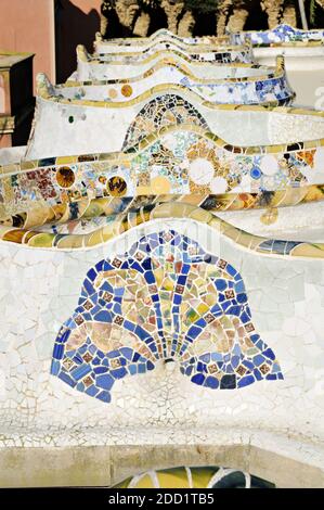 Serpentine bench covered with tile-shard mosaic, Park Güell, Barcelona, Catalonia, Spain Stock Photo