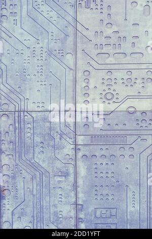 Background of stone wall with carved computer circuit board pattern Stock Photo