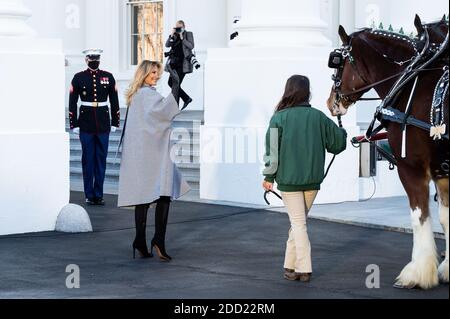 First lady Melania Trump waves to the crowd during a town hall on ...