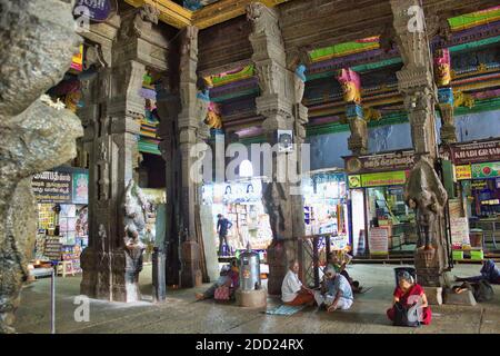 Madurai, India - November 02, 2018: Concrete ancient pillars inside of a hindu temple named Thiruparankundram Murugan or Subramanya Swamy Temple Stock Photo