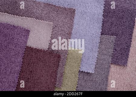 Bright collection of gunny textile samples. Multicolor Fabric texture background. Stock Photo