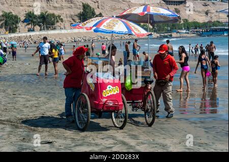 Vendors on Chorrillos Beach sell ice cream in Lima, Peru- 1 May 2015 Stock Photo