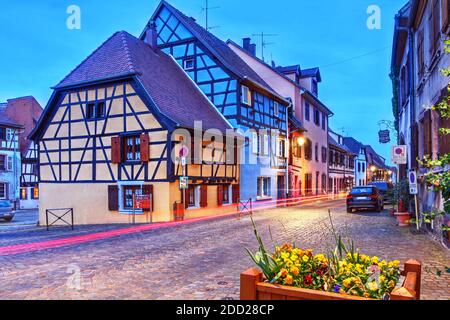 Night scene with beautiful typical half-timber houses in Bergheim, a well preserved medieval town in Alsace, France along the famous wine route. Stock Photo