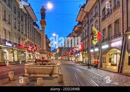 Night scene along Marktgasse (Market Street) in the old town of Bern (Berne, Berna), Switzerland Stock Photo