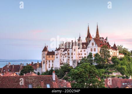 Neuchatel Castle, Switzerland bathing in the warm sunset light Stock Photo