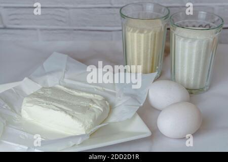 Ingredients for cottage cheese casserole on white background Stock Photo