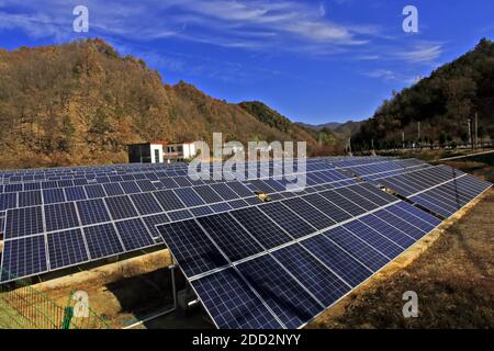 The western mountainous rural photovoltaic power station Stock Photo