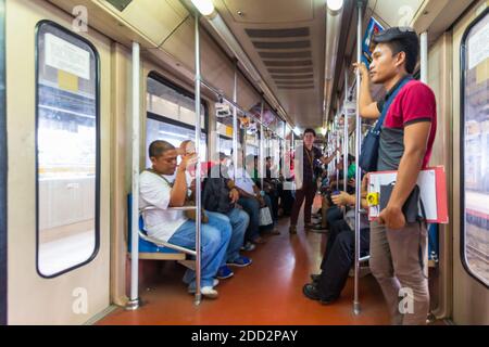 Inside a rail cart of the Manila light rail transit system in the Philippines Stock Photo