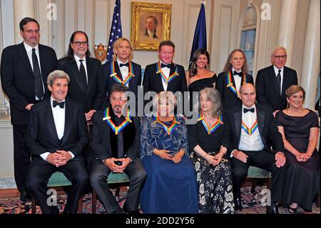 The five recipients of the 39th Annual Kennedy Center Honors pose for a group photo following a dinner hosted by United States Secretary of State John F. Kerry in their honor at the U.S. Department of State in Washington, DC on Saturday, December 3, 2016. The 2016 honorees are: Argentine pianist Martha Argerich; rock band the Eagles; screen and stage actor Al Pacino; gospel and blues singer Mavis Staples; and musician James Taylor. From left to right back row: Ricky Kirshner, Glenn Weiss, Joe Walsh, Don Henley, Cindy Frey, wife of Glenn Frey, who passed away earlier this year, and Timothy B Stock Photo
