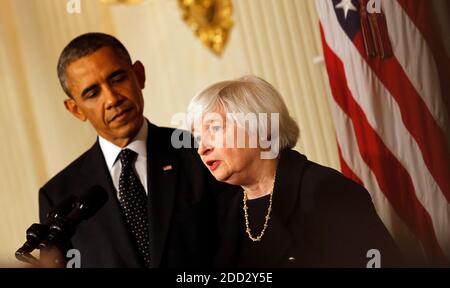 United States President Barack Obama listens to Dr. Janet Yellen after announcing his intent to nominate her as Chair of the Board of Governors of the Federal Reserve System, in the State Dining Room Room of the White House in Washington DC, USA, October 09, 2013. Dr. Yellen will be the first woman to head the central bank in its 100 year history. Credit: Aude Guerrucci/Pool via CNP | usage worldwide Stock Photo