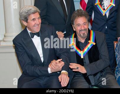 United States Secretary of State John Kerry, left, shakes hands with actor Al Pacino, right, as they prepare prepare to pose The five recipients of the 39th Annual Kennedy Center Honors pose for a group photo following a dinner hosted by United States Secretary of State John F. Kerry in their honor at the U.S. Department of State in Washington, DC on Saturday, December 3, 2016. The 2016 honorees are: Argentine pianist Martha Argerich; rock band the Eagles; screen and stage actor Al Pacino; gospel and blues singer Mavis Staples; and musician James Taylor.Credit: Ron Sachs/Pool via CNP | us Stock Photo
