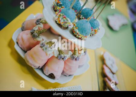 A selective focus closeup of candy-coated chocolate dessert with colorful designs Stock Photo