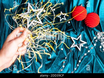 Flat lay christmas composition in trendy colors with defocused sparks. Magic concept. Stock Photo