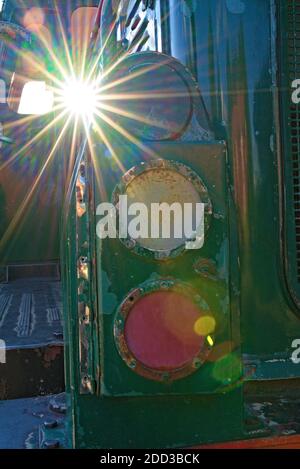 Worn headlights on an old diesel locomotive, close up.  Stock Photo
