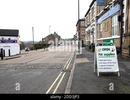 A deserted Market Street in New Mills, Derbyshire Stock Photo