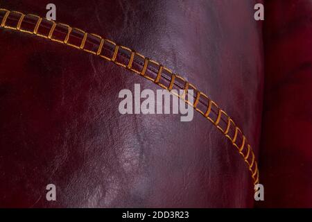 Machine stitch on leather fabric close up macro Stock Photo