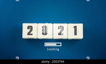 Top view of wooden cubes with 2021 text and progress loading bar new year concept Stock Photo