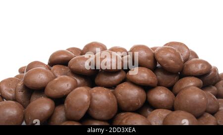 Typical Dutch 'Sinterklaasfeest' candy Chocolate Pepernoten photographed on white background Stock Photo