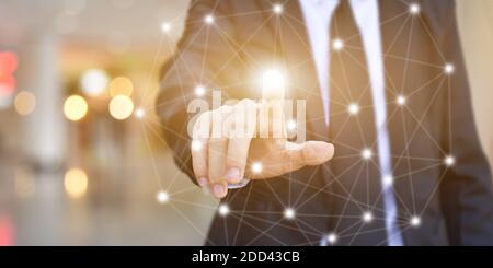 Businessman hands touching point network connection on blurred background. Wireless connect futuristic concept. Stock Photo