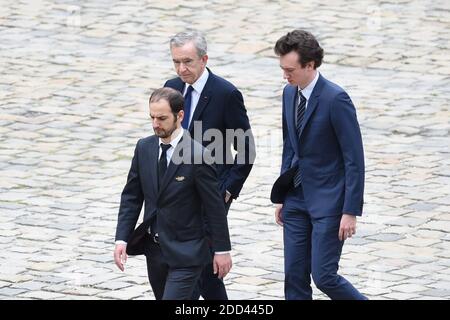 The chairman and CEO of the French conglomerate LVMH Moet Hennessy Louis  Vuitton SA Bernard Arnault (M) and his son Antoine Arnault (L) walks out  the Stock Photo - Alamy