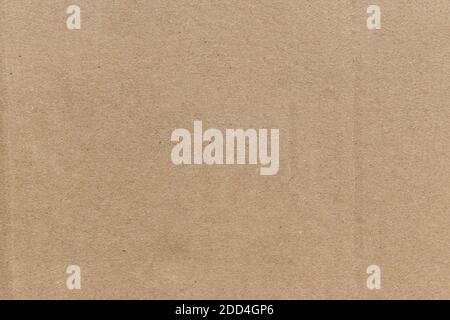 Beige cardboard texture background. Old vintage brown paper box surface. Stock Photo
