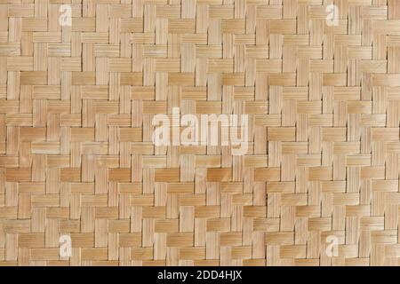 Texture of bamboo weaving. Traditional handicraft weave asian style pattern background. Stock Photo