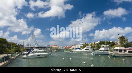 Main water canal with ships in Bridgetown, capital of Barbados. Caribbean Stock Photo