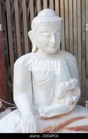 marble Buddha, Amarapura Mandalay, Myanmar (Burma), Asia in February - at marble stone carving workshops covered in dust Stock Photo