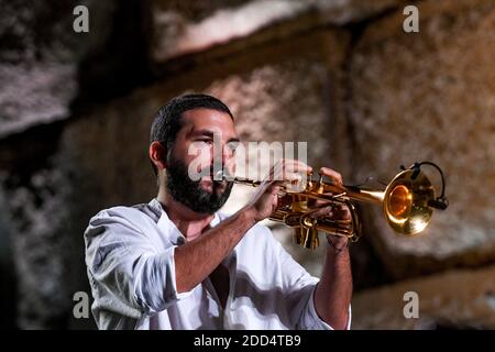 French trumpet player Ibrahim Maalouf seen on the steps of the temple of Bacchus in the ancient city of Baalbeck, east of Beirut, Lebanon, on August 4, 2018, during 'M' or Matthieu Chedid's concert as part of the summer yearly festival held in the Roman ruins. Both Chedid and Maalouf family roots come from Lebanon and this was their first concert together there. Photo by Ammar Abd Rabbo/ABACAPRESS.COM Stock Photo