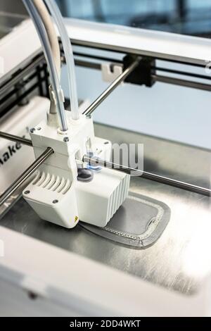 printer head of 3D printer rapid prototyped plastic parts Stock Photo
