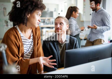 Business team sitting sad and solving problem in office. Stock Photo