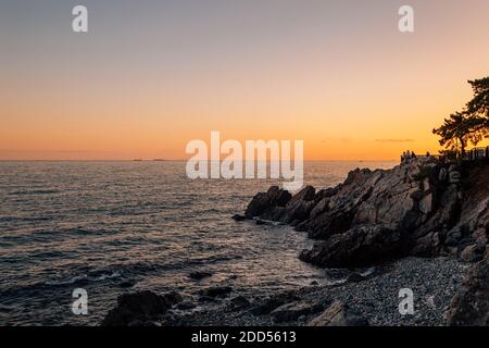 Sunset of Haeundae Dongbaekseom island and sea in Busan, Korea Stock Photo