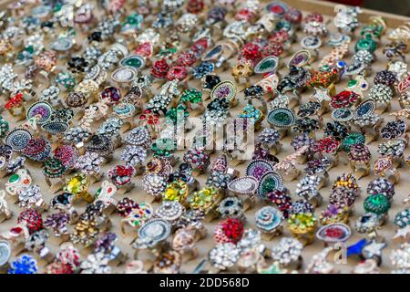 Colorful rings with gems in Grand Bazaar of Istanbul, Turkey Stock Photo