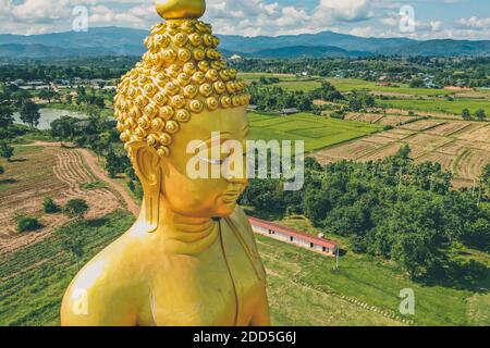 Big Golden buddha statue in chiang Rai, Chiang Mai Province, Thailand Stock Photo