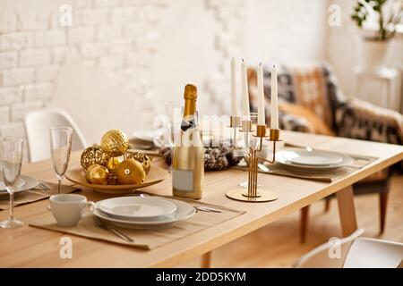 Christmas table setting with holiday decorations. Stock Photo